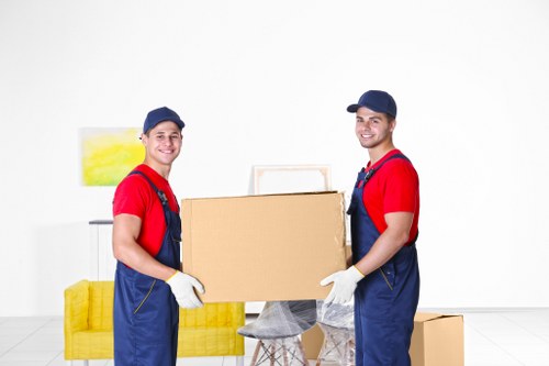 Office relocation planning in South Kensington with boxed equipment and prepared workspace