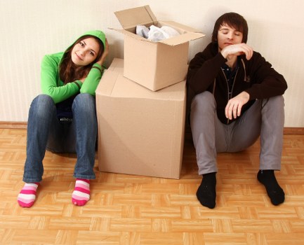 Packed office equipment and boxes prepared for a business move in South Kensington