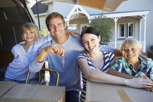 Professional movers loading furniture for a central London relocation