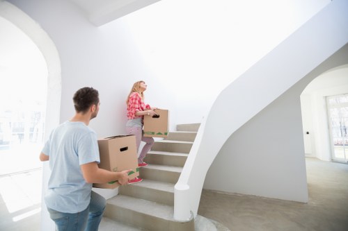 Preparing boxes and furniture for a home move in South Kensington