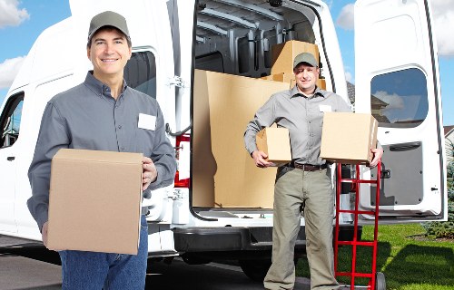 Moving boxes and household items in a South Kensington removal